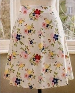 Illustration of an A-line skirt with a fitted waist and subtle flare, shown as a voting option for the Babs & Edna design challenge.