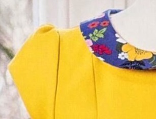 Capped sleeve pattern with minimal, structured shape.