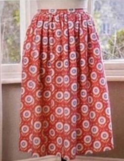 Illustration of a gathered skirt with fullness at the waist, shown as a romantic option for the skirt vote.